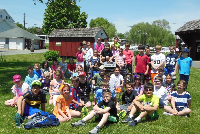 Group of school kids in an Amish buggy