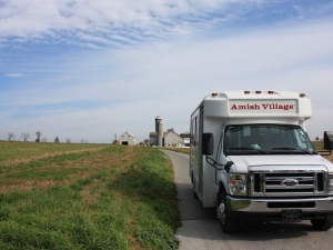 Amish Village tour bus parked
