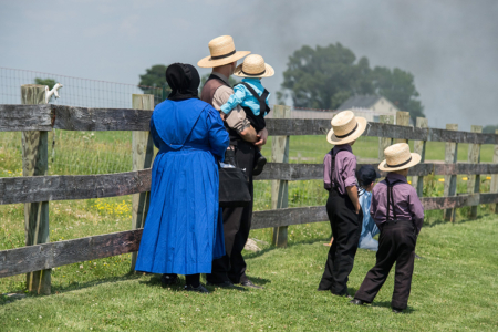 Lancaster, Usa - June 25, 2016: Amish people in Pennsylvania. Amish are known for simple living with touch of nature contacy, plain dress, and reluctance to adopt conveniences of modern technology