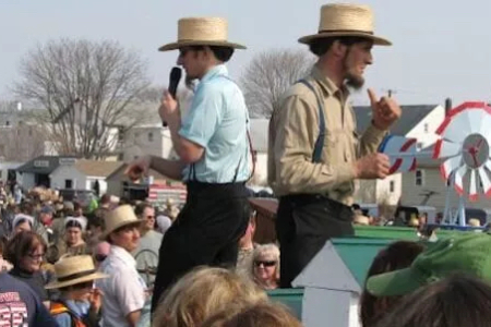 Two Amish Auctioneers hosting at a local mudsale in Lancaster county