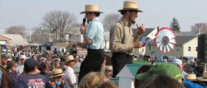 Two Amish Auctioneers hosting at a local mudsale in Lancaster county