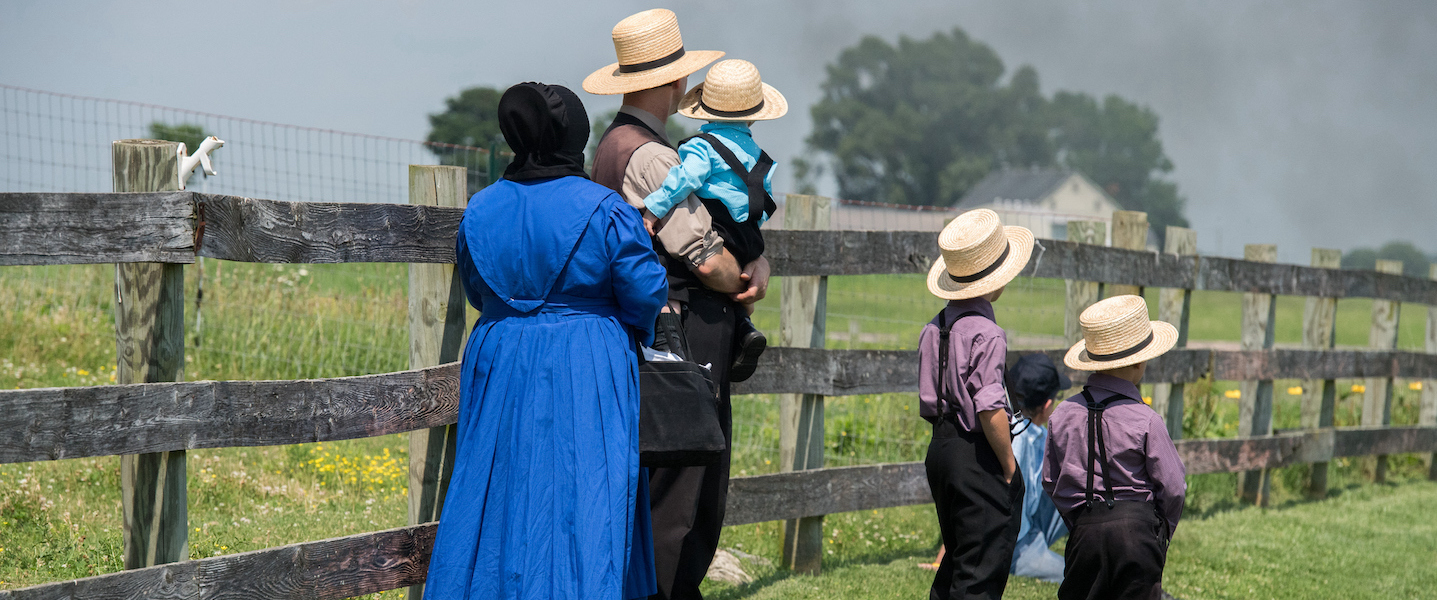 Lancaster, Usa - June 25, 2016: Amish people in Pennsylvania. Amish are known for simple living with touch of nature contacy, plain dress, and reluctance to adopt conveniences of modern technology